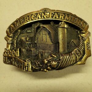 Vintage "AMERICAN FARMERS FEED THE WORLD" Brass Belt Buckle 1984 (Pre-Owned)